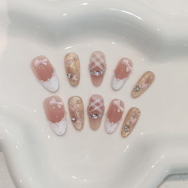 <p><strong>Glamorous Medium Reusable Almond Press-On Nails: Pink Cat Eye Glitter with Polka Dot French Tips, Hand-Painted Hearts & 3D Bow Rhinestones – Complete Princess K-Beauty Manicure Kit (Size S)</strong></p> - Image 2