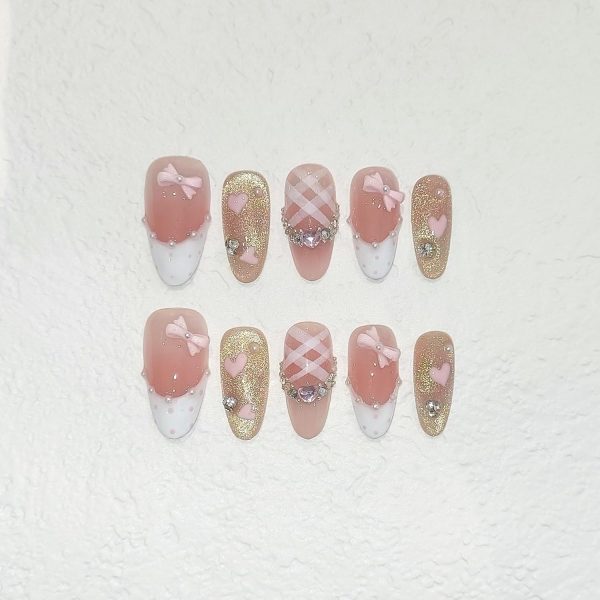 <p><strong>Glamorous Medium Reusable Almond Press-On Nails: Pink Cat Eye Glitter with Polka Dot French Tips, Hand-Painted Hearts & 3D Bow Rhinestones – Complete Princess K-Beauty Manicure Kit (Size S)</strong></p> - Image 5