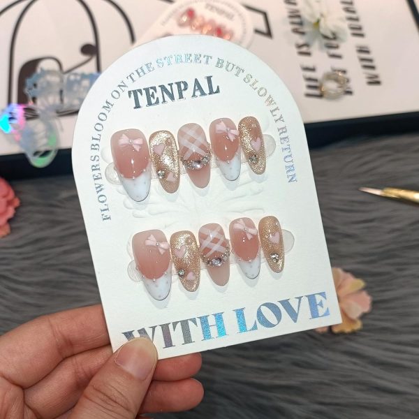 <p><strong>Glamorous Medium Reusable Almond Press-On Nails: Pink Cat Eye Glitter with Polka Dot French Tips, Hand-Painted Hearts & 3D Bow Rhinestones – Complete Princess K-Beauty Manicure Kit (Size S)</strong></p> - Image 6