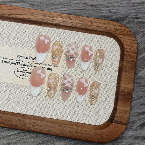 <p><strong>Glamorous Medium Reusable Almond Press-On Nails: Pink Cat Eye Glitter with Polka Dot French Tips, Hand-Painted Hearts & 3D Bow Rhinestones – Complete Princess K-Beauty Manicure Kit (Size S)</strong></p> - Image 3